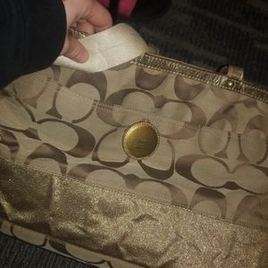 Coach large golden with golden sparkle band bag